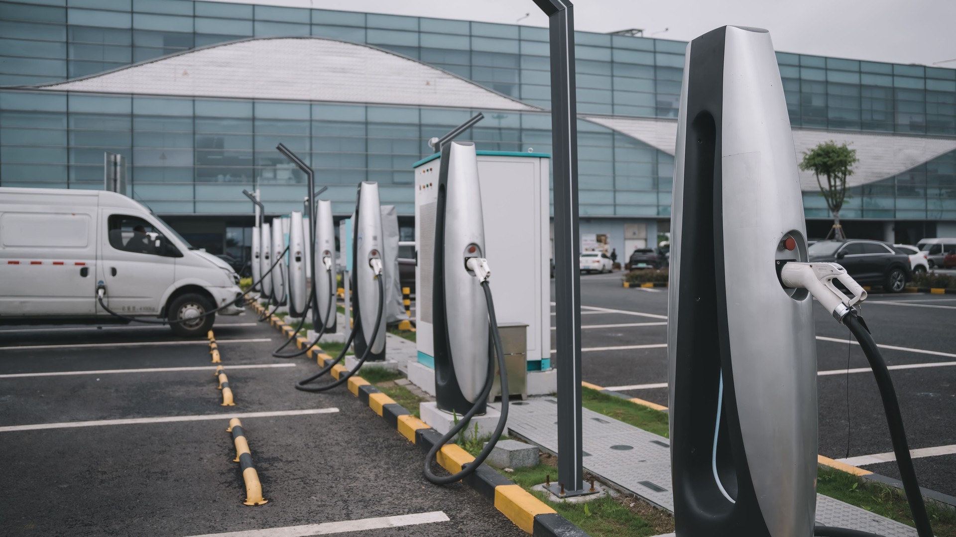Modern Electric Vehicle Charging Stations at Urban Parking Lot